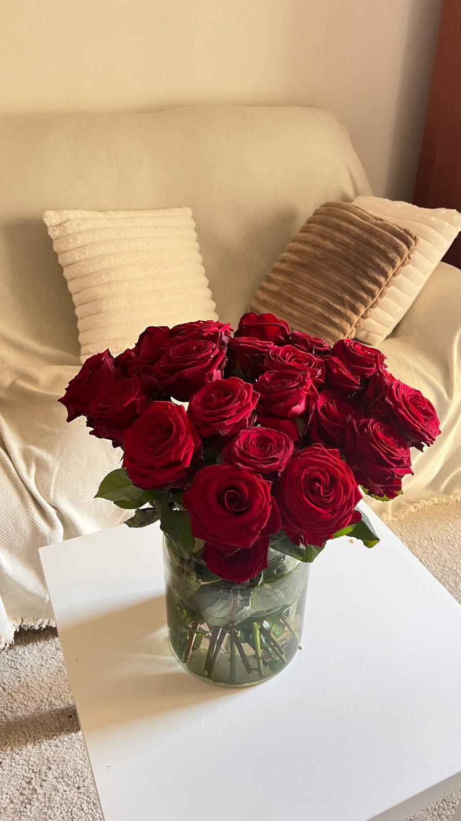 Roses en gerro de vidre